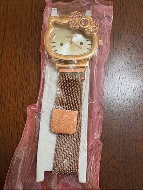 Hello Kitty Rose Gold and Pink Crystal Bow Mesh Strap Watch